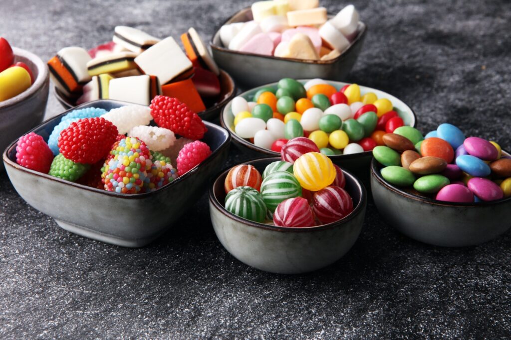 candies with jelly and sugar. colorful array of different childs sweets and treats